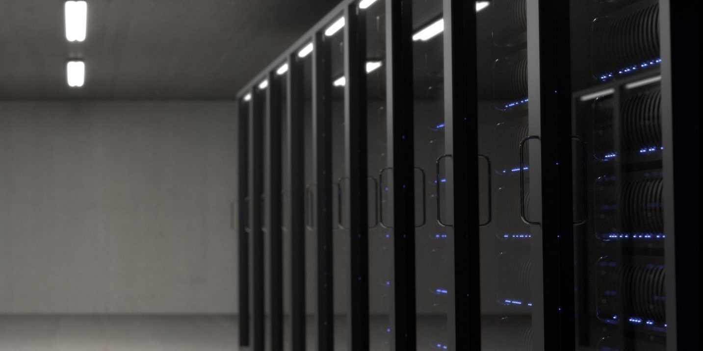 row of computer servers with glass doors